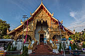 Chiang Mai - The Wat Phra Singh temple. The large Viharn Luang (main prayer hall) with an intricately carved front.  